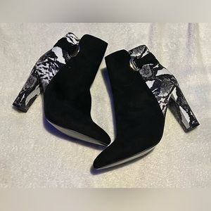snake skin heeled boots